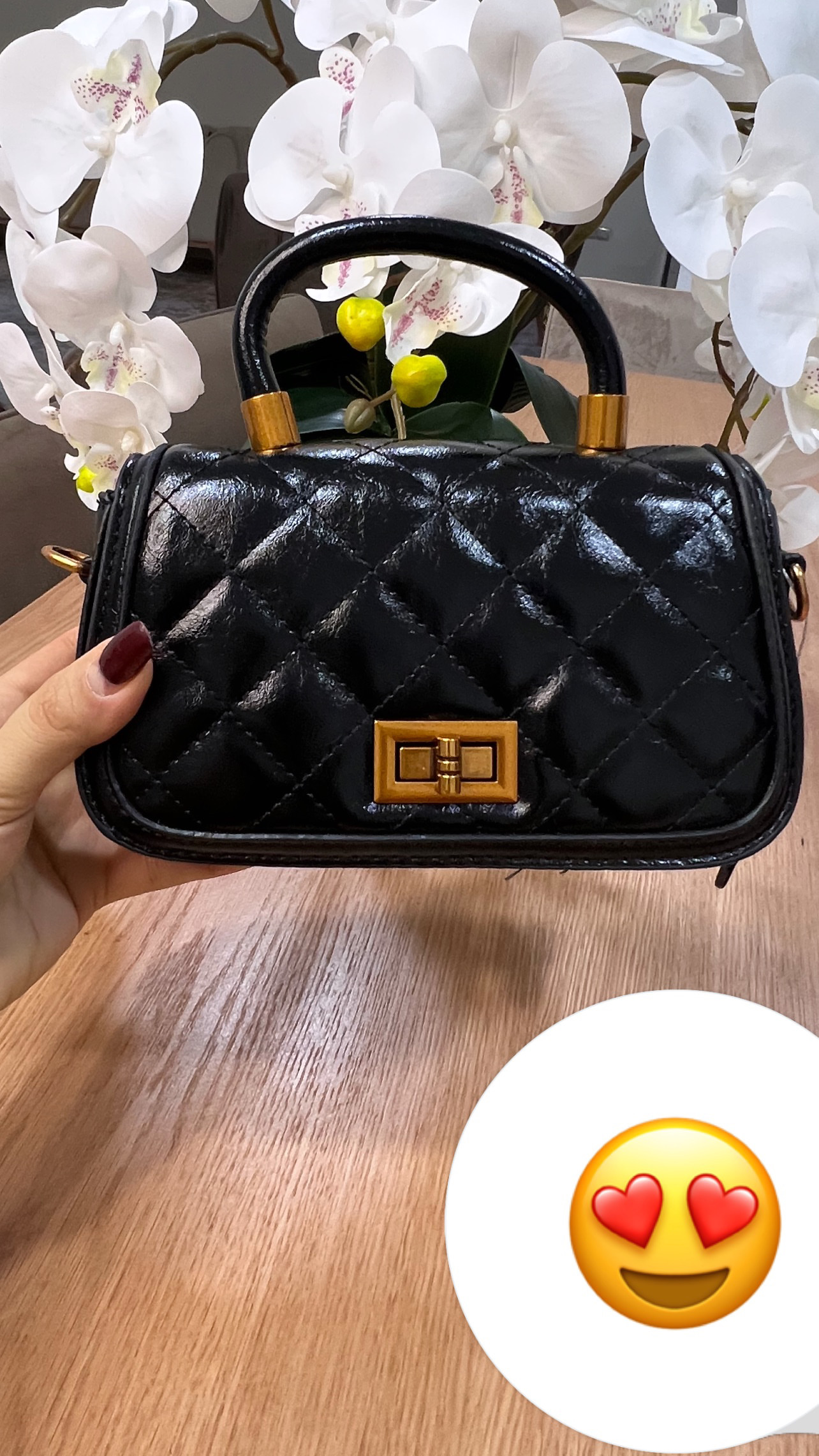 کیف چرم مشکی با یراق طلایی